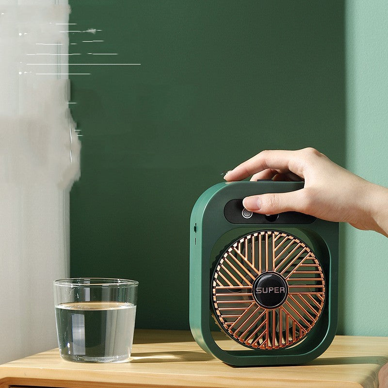 Mini desk fan cooling study table in college dormitory